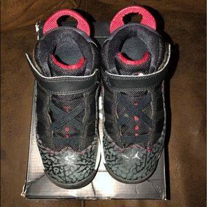 Black and red Jordan shoes for boys